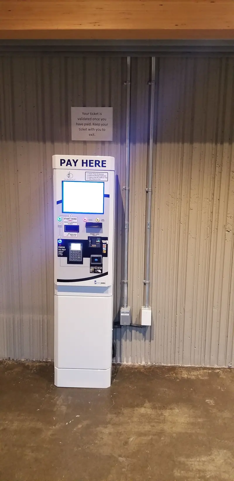 Parking BOXX hospital parking system installed at a healthcare facility — barrier gates, pay stations, and CloudEASE management