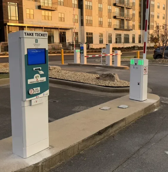 Parking BOXX entry lane installed at a hotel lot at dusk
